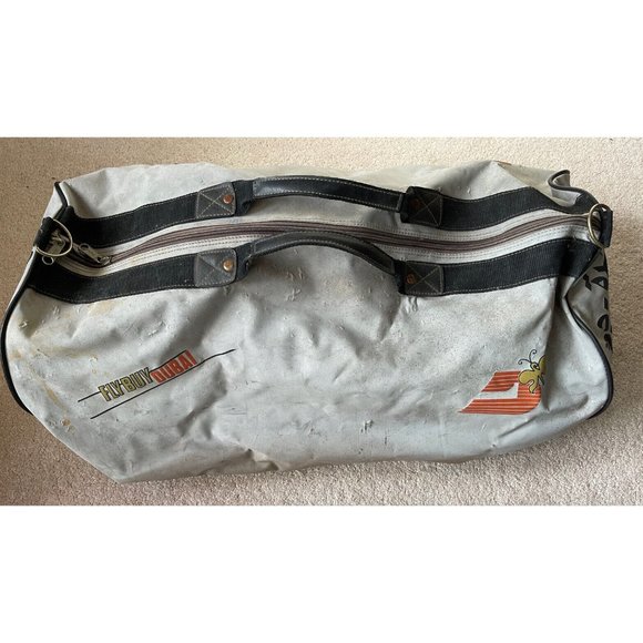 Fly Buy Dubai duffle bag preowned - There is wear on this large bag. 24" x11"